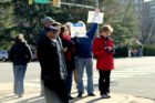 Onlookers greet veterans and President Obama