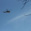 Security choppers circle during presidential visit