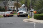 A cement truck backed into two utility poles on 16th Street N.