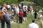 Spectators at the Air Force Memorial watching the space shuttle Discovery