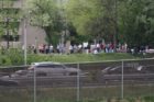 Spectators at Prospect Hill Park watching the space shuttle Discovery