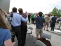 Spectators at the Air Force Memorial watching the space shuttle Discovery