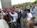 Spectators at the Air Force Memorial watching the space shuttle Discovery