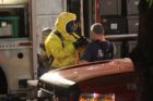 Police and firefighters investigate a possible meth lab in a Virginia Square apartment building