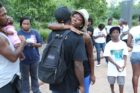 A candlelight vigil was held in the Hall's Hill community for homicide victims Keefe Spriggs and Carl Moten