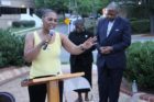 A candlelight vigil was held in the Hall's Hill community for homicide victims Keefe Spriggs and Carl Moten