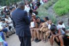 A candlelight vigil was held in the Hall's Hill community for homicide victims Keefe Spriggs and Carl Moten