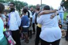 A candlelight vigil was held in the Hall's Hill community for homicide victims Keefe Spriggs and Carl Moten