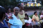 A candlelight vigil was held in the Hall's Hill community for homicide victims Keefe Spriggs and Carl Moten