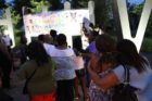 A candlelight vigil was held in the Hall's Hill community for homicide victims Keefe Spriggs and Carl Moten