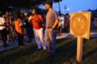 A candlelight vigil was held in the Hall's Hill community for homicide victims Keefe Spriggs and Carl Moten