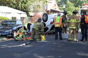 A car flipped on its roof near Patrick Henry Elementary School