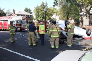 A car flipped on its roof near Patrick Henry Elementary School