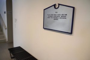 Local historical marker created by artist Timothy Thompson inside the Arlington Arts Center