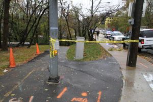 Police investigate a likely suicide on the Four Mile Run Trail under Columbia Pike