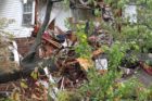 A tree came crashing through a house on the 2800 block of 2nd Road N. in Lyon Park. Four people were at home at the time; all escaped unscathed.