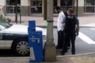A suspect is taken into custody near Courthouse Plaza (courtesy photo)