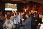 Democrats celebrating election returns at the Arlington Cinema Drafthouse
