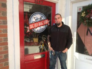 Owner Larry Behery outside The Old Bike Shop in Lyon Park