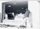 Installation of new window at Green Valley Pharmacy (photo from 1958, via Arlington County website)