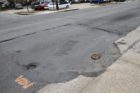 Patched-up section of road on Columbia Pike