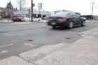 Patched-up section of road on Columbia Pike