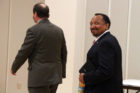 E.W. Jackson walks by reporters without answering questions