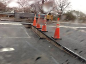 Roadway damage on the Roosevelt Bridge (photo courtesy @katiekirk)