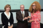 Dispatcher Shanika Stewart, right, accepts her CIT award (photo courtesy Office of Emergency Management)