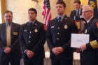 Firefighters Jamie Jill and Nicolas Calderone receive the ACFD's Lifesaving award