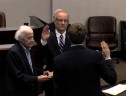 Board member John Vihstadt being sworn in