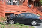 A 70-year-old woman in a Hyundai crashed into a condo building on S. George Mason Drive