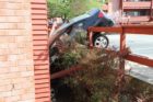 A 70-year-old woman in a Hyundai crashed into a condo building on S. George Mason Drive