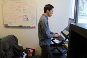 Encore Alert Founder/CEO James LI works at his UberOffices workspace