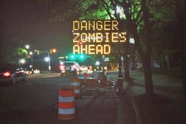 Hacked road sign on Columbia Pike warns of zombies ahead (photo courtesy celialarsen)