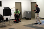 A voter talks to an election official at Arlington Central Library polling place