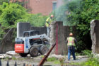 Workers tear down part of The W&OD trestle in East Falls Church