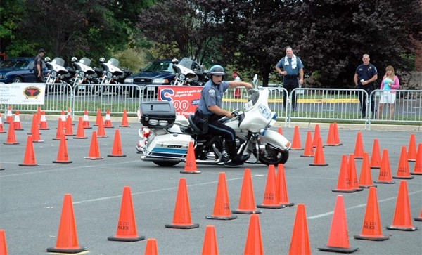 An ACPD motor officer participates in a police 