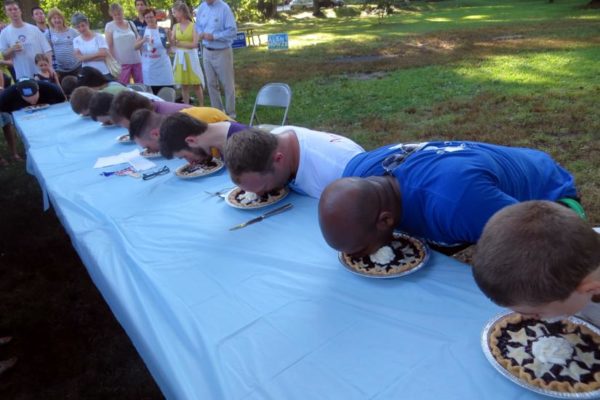 Arlington Democrats pie-eating contest 2014 (Flickr pool photo by Alan Kotok)