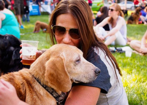 A woman and her dog at last week's Pups and Pilsners event in Crystal City (Flickr pool photo by Rob Cannon)