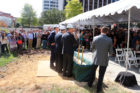 A large crowd of CEB employees gather to watch officials break ground on CEB Tower in Rosslyn