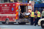 A taxi strikes a pedestrian in Rosslyn Sept. 4, 2014