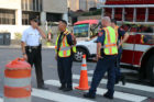 A taxi strikes a pedestrian in Rosslyn Sept. 4, 2014