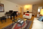 Steve living room to piano and stairs_825x552