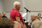 A delegate of the Arlington Civic Federation questions County Board candidates