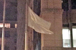 White flag flying outside Ballston's Office of Naval Research (photo courtesy Lori Klein)