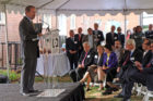 Edmund Delaney of Capital One Bank speaks to the crowd at the groundbreaking for the Union at Queen apartments