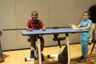 Student on a pedal desk