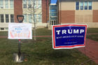 Donald Trump and Bernie Sanders signs outside the Arlington Arts Center