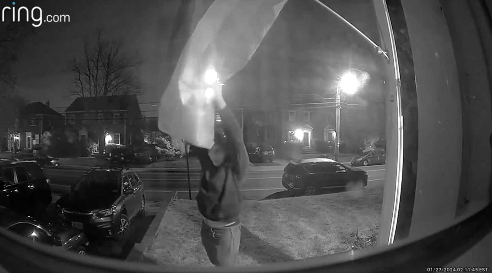 Security camera footage of a Pride flag being stolen on Jan. 27, 2024